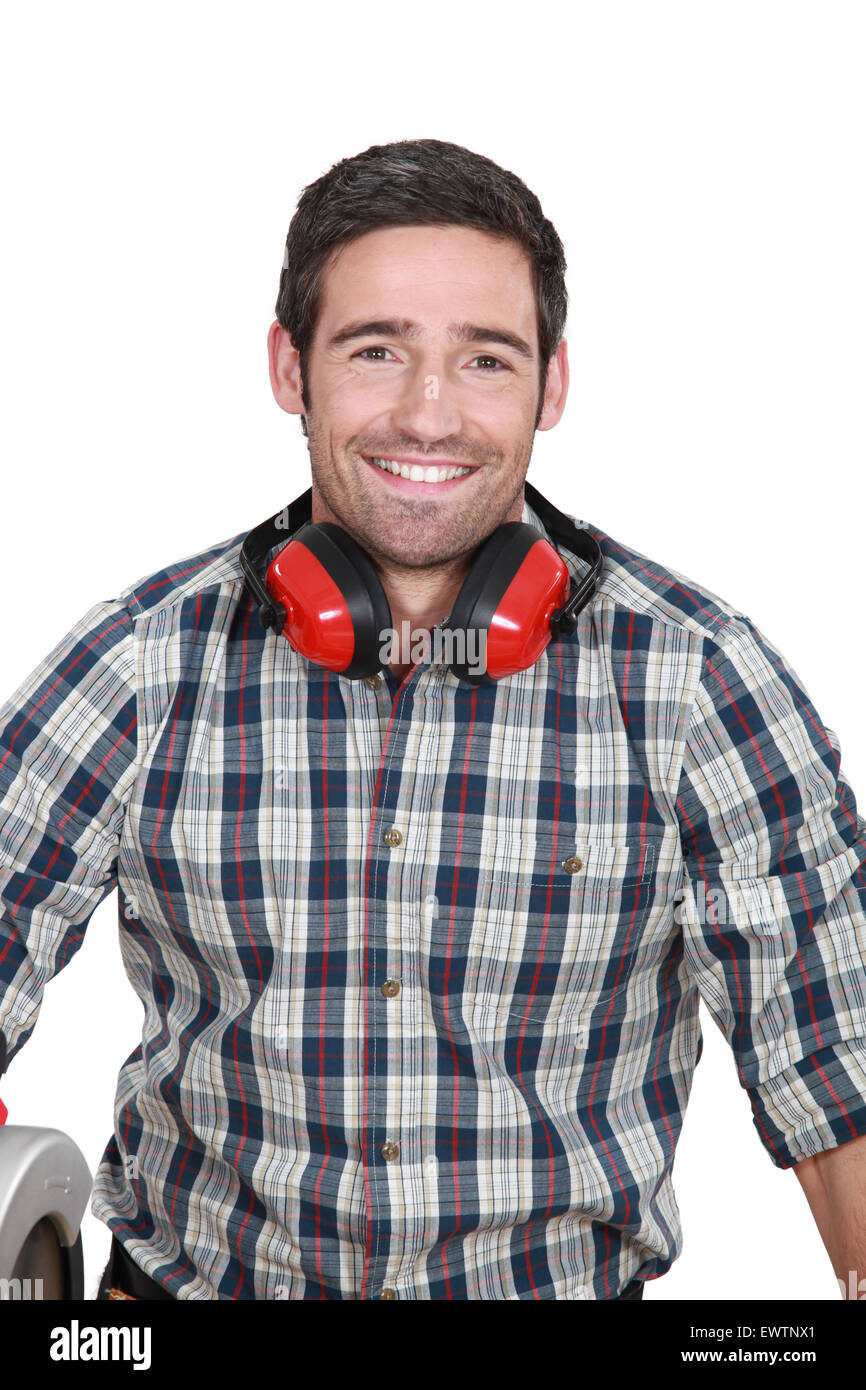 Man wearing ear muffs Stock Photo Alamy