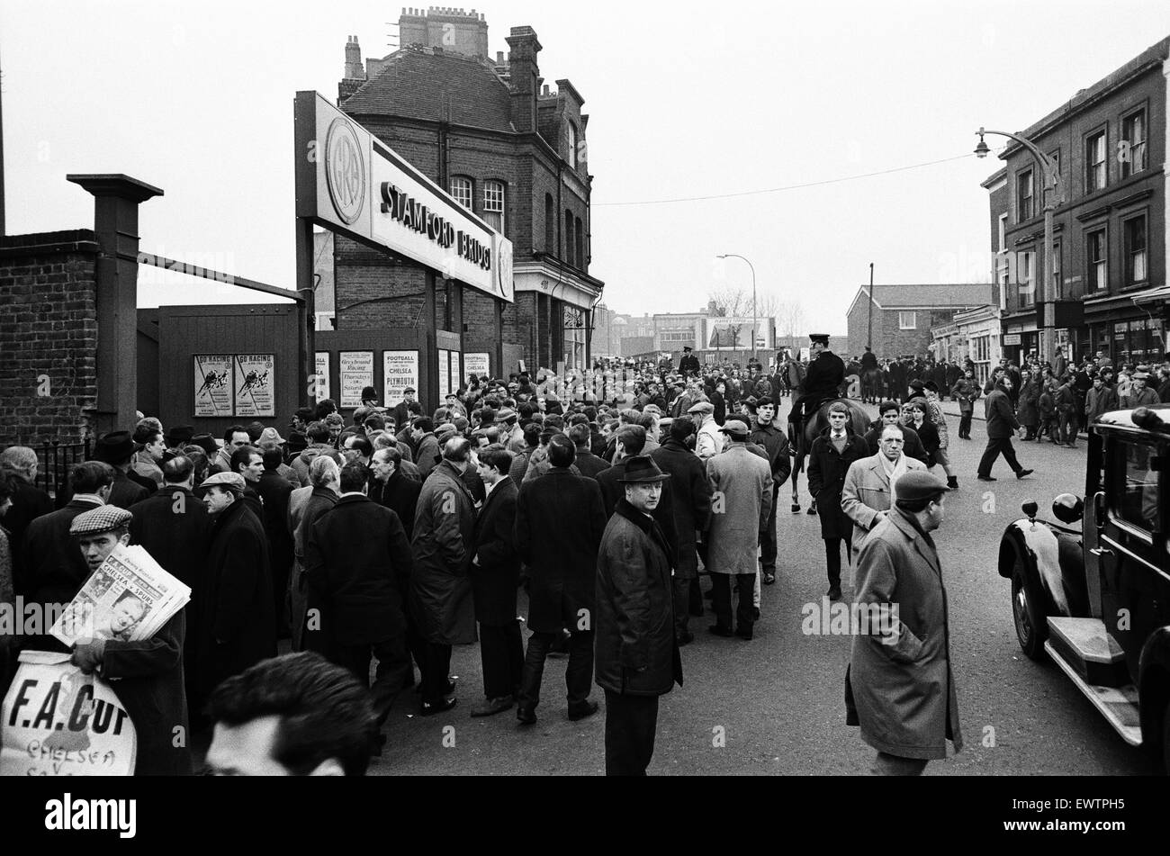 Scenes outside Stamford Bridge stadium half an hour before a match between Chelsea v Tottenham Hotspur, FA Cup 5th round, London. 20th February 1965. Stock Photo