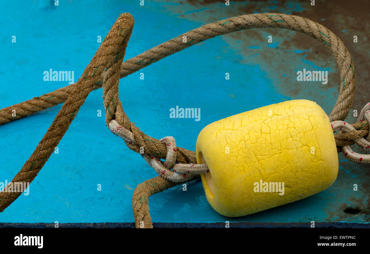 Close up yellow float attached rope hi-res stock photography and images ...