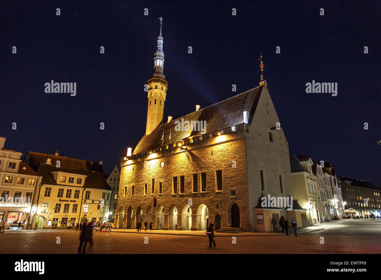TALLINN, ESTONIA - APRIL 25, 2015 : Front view of medieval Lutheran Church of the Holy Ghost in Tallinn, Estonia, in dark on nav Stock Photo