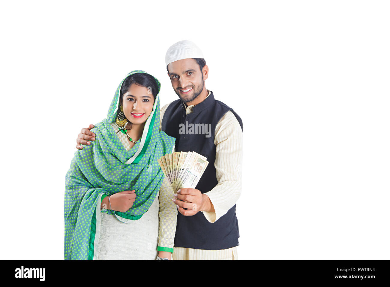2 indian Muslim Married Couple showing money Stock Photo - Alamy