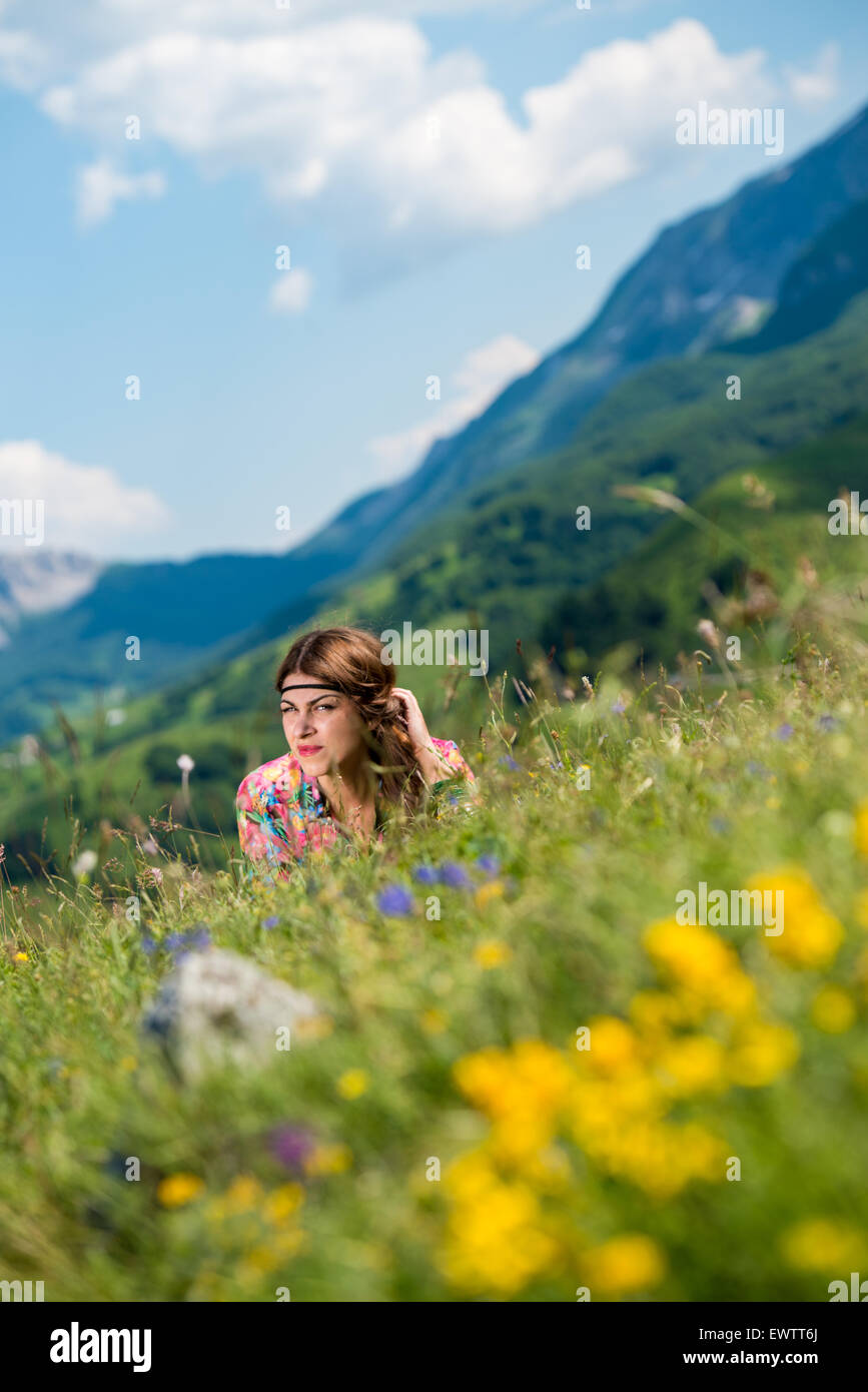 beautiful woman lying on the grass Stock Photo - Alamy