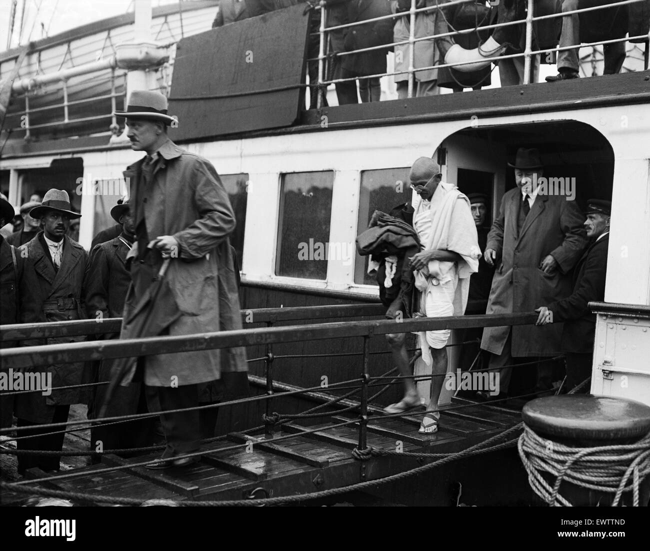 Mohandas 'Mahatma' Gandhi, leader of the  Indian independence movement in British-ruled India, pictured during his visit to Britain in 1931. Here he is pictured on his arrival in Folkestone, Kent where he sailed to from France. 12th September 1931. Stock Photo