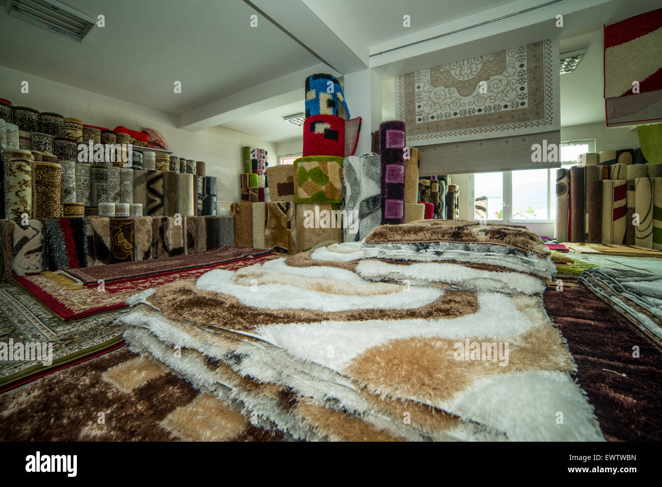 Rolled Rugs Inside A Rug Store Stock Photo Alamy