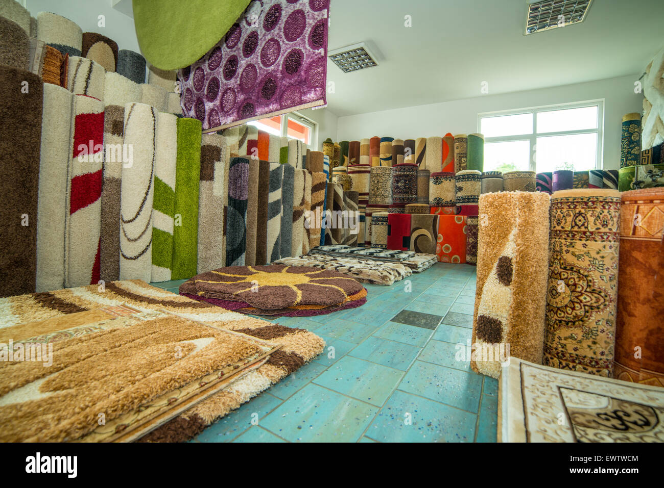 Carpets And Rugs Rolled Up & Displayed Stock Photo Alamy