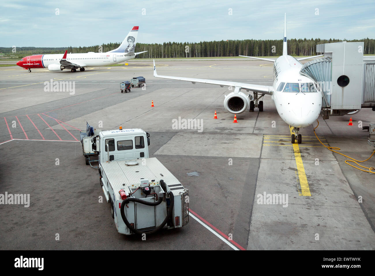airplanes on helsinki vantaa airport landing and waiting for passengers Stock Photo
