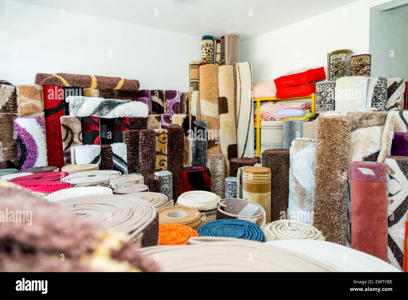 Rolled Rugs Inside A Rug Store Stock Photo Alamy