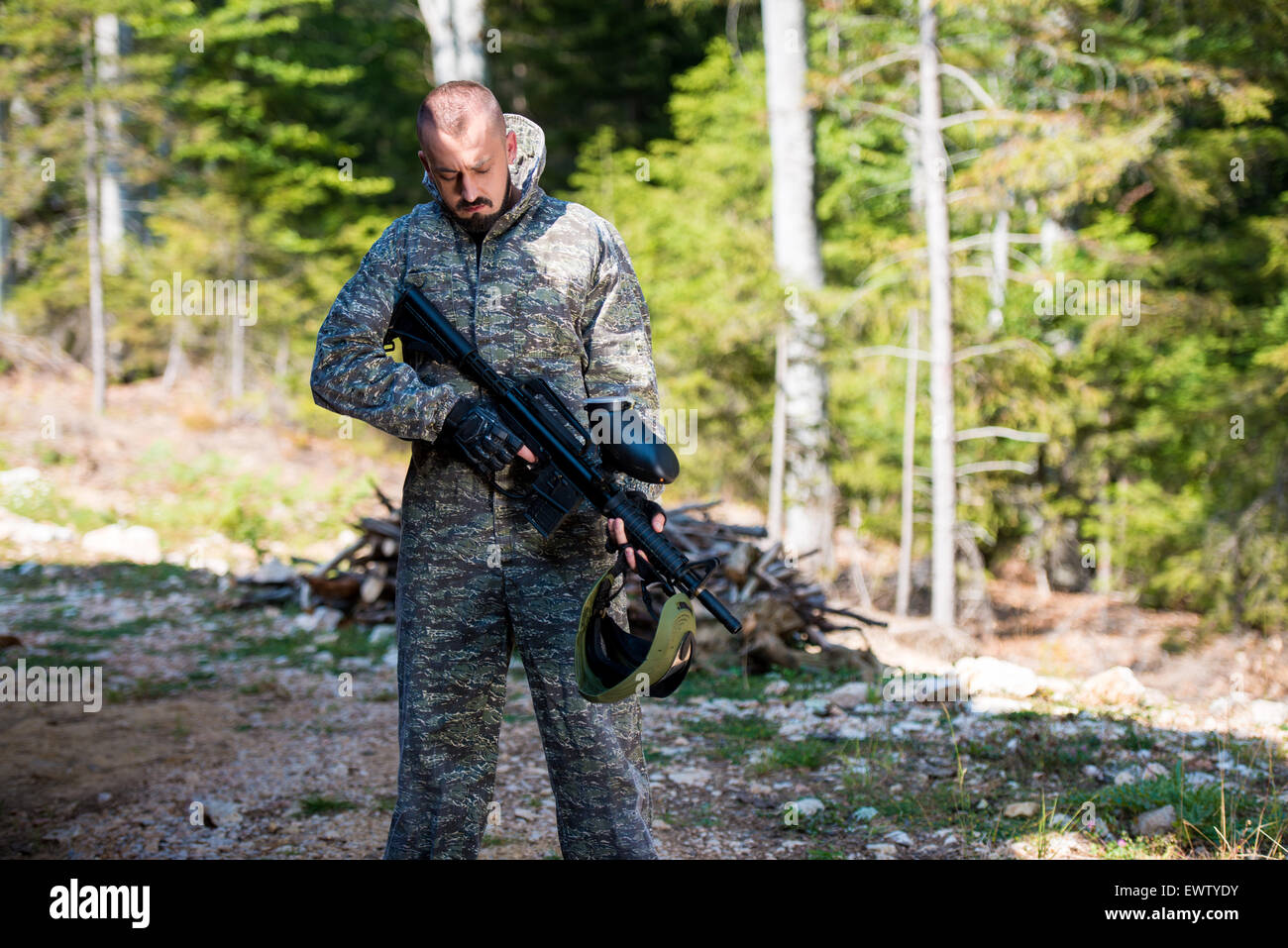 Paintball player preparing for battle Stock Photo Alamy