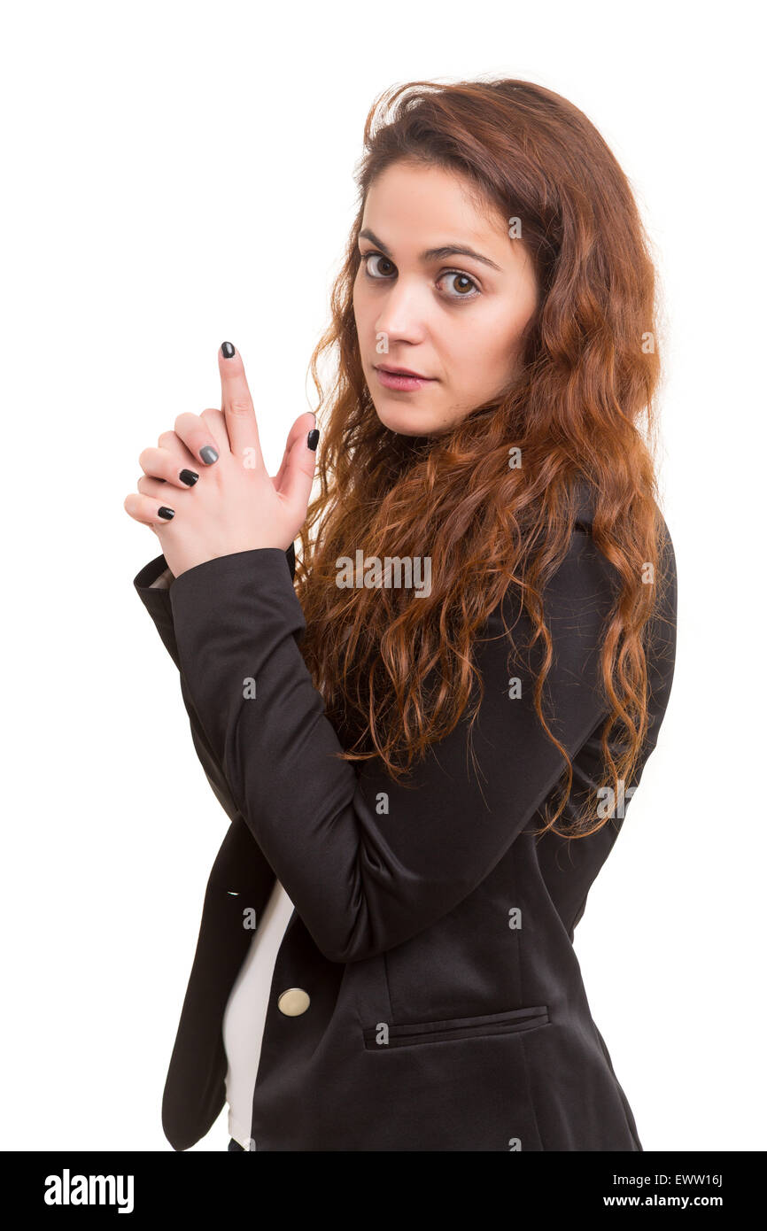 Young woman making a gun with her hands - business concept Stock Photo