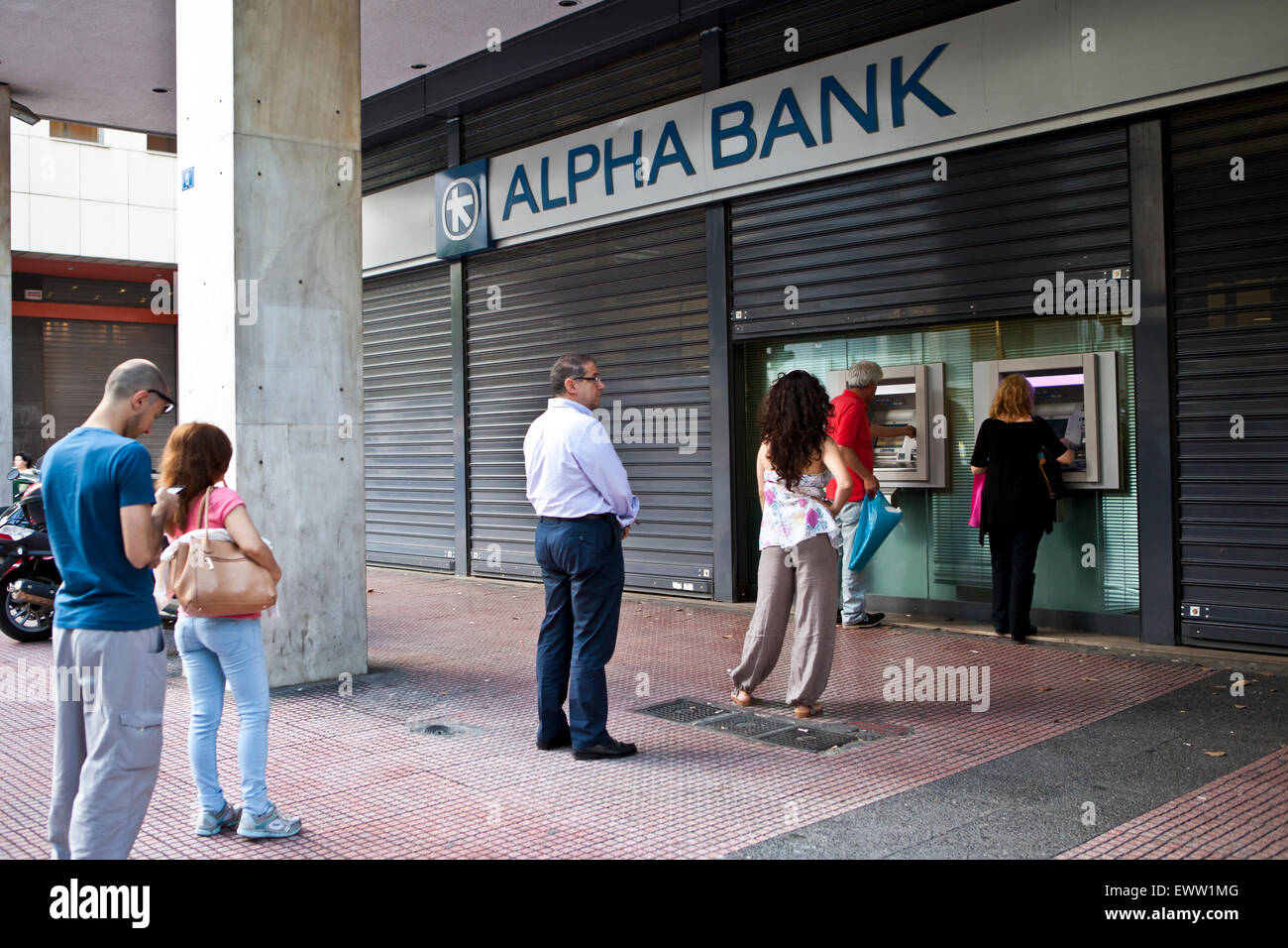 Athens, Greece. 01st July, 2015. Alpha Bank queues amid the Bank capital controls in Athens, Greece. Credit:  Martin Garnham/Alamy Live News Stock Photo