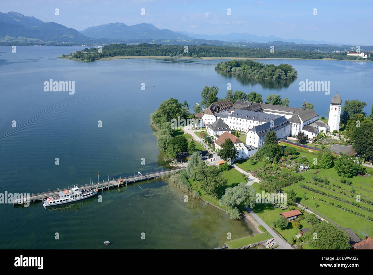 AERIAL VIEW. Benedictine Abbey of Frauenwörth on Frauenchiemsee (also known as Fraueninsel) island. Lake Chiemsee, Bavaria, Germany. Stock Photo