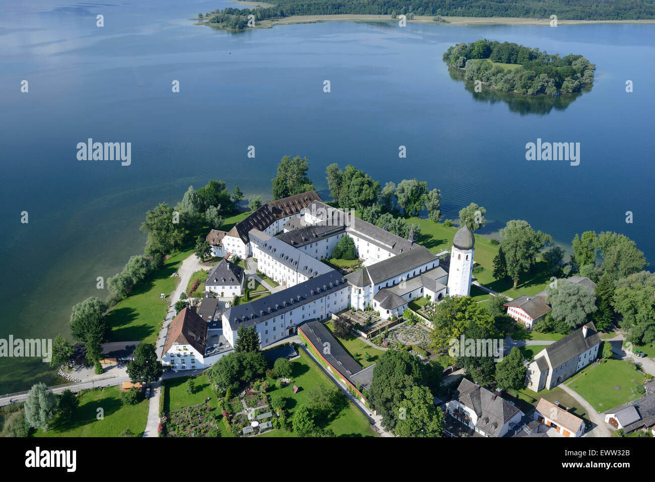 AERIAL VIEW. Benedictine Abbey of Frauenwörth on Frauenchiemsee (also known as Fraueninsel) island. Lake Chiemsee, Bavaria, Germany. Stock Photo