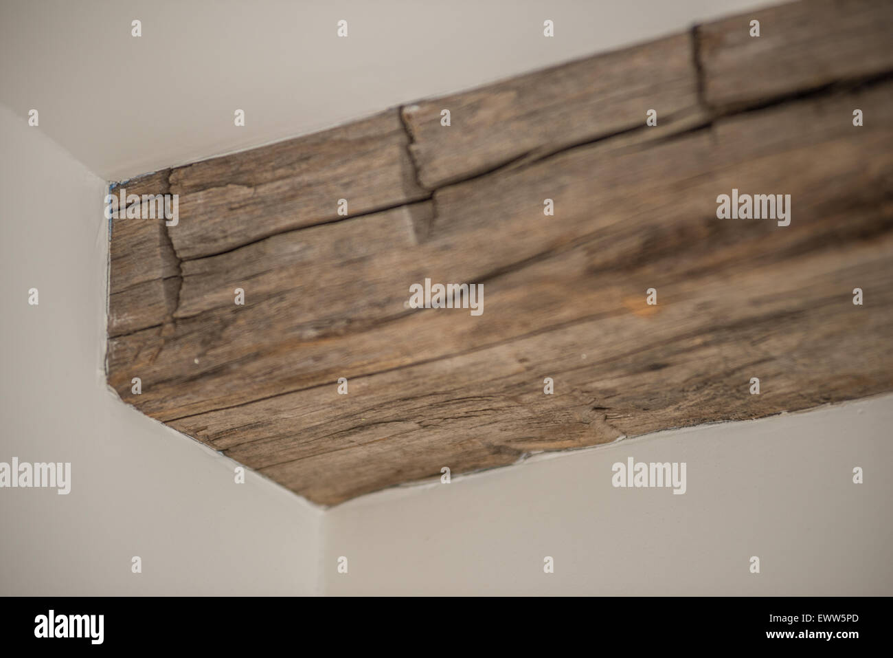 Distressed, rustic, country-style wood ceiling beam Stock Photo