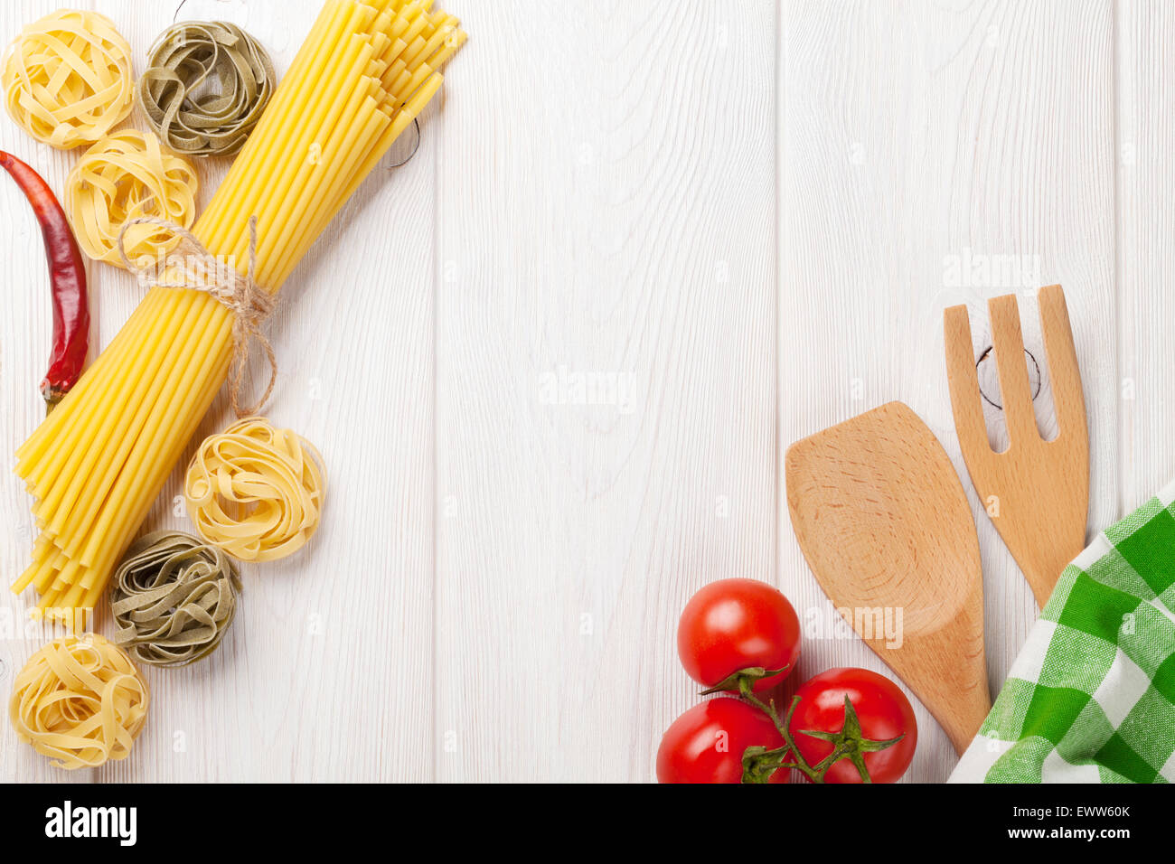 Italian food cooking ingredients. Pasta, vegetables, spices. Top view with copy space Stock Photo