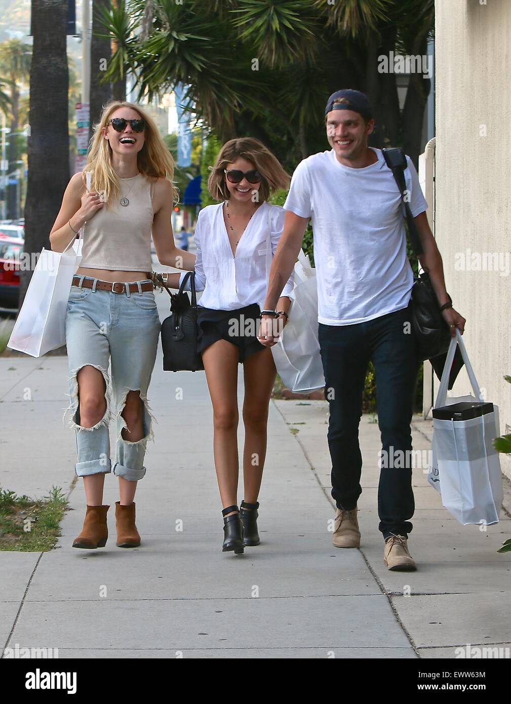 Sarah Hyland Dominic Sherwood And Lucy Fry Out And About In Los Angeles Sarah Wearing A Merritt Charles Top And Shorts And Accenting The Outfit With Jewelry From The Timeless Collection By