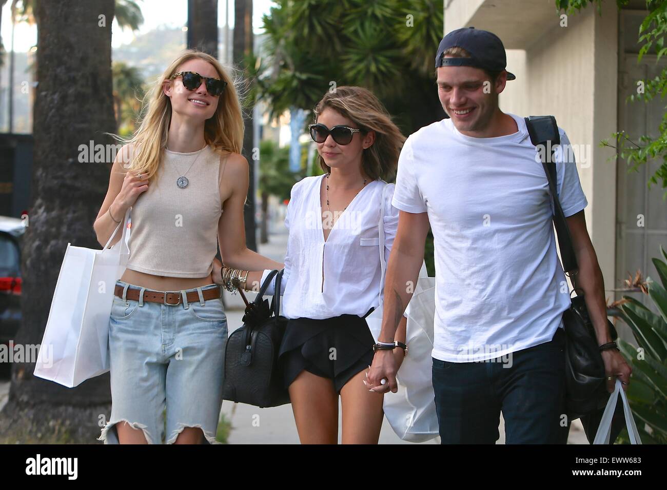 Sarah Hyland Dominic Sherwood And Lucy Fry Out And About In Los Angeles Sarah Wearing A Merritt Charles Top And Shorts And Accenting The Outfit With Jewelry From The Timeless Collection By
