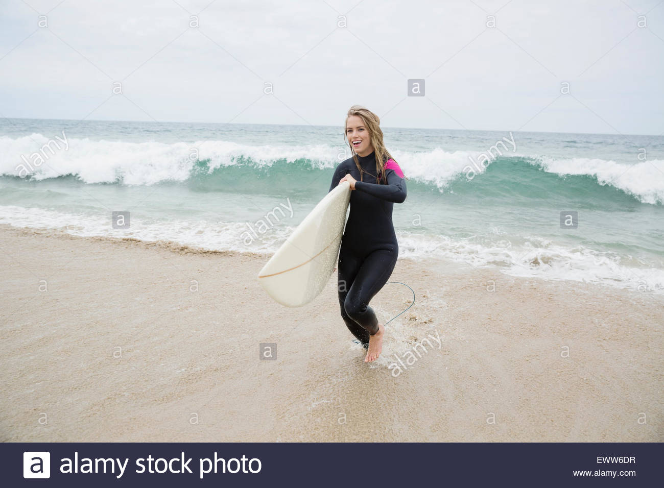 Female surfer surfboard hi-res stock photography and images - Alamy