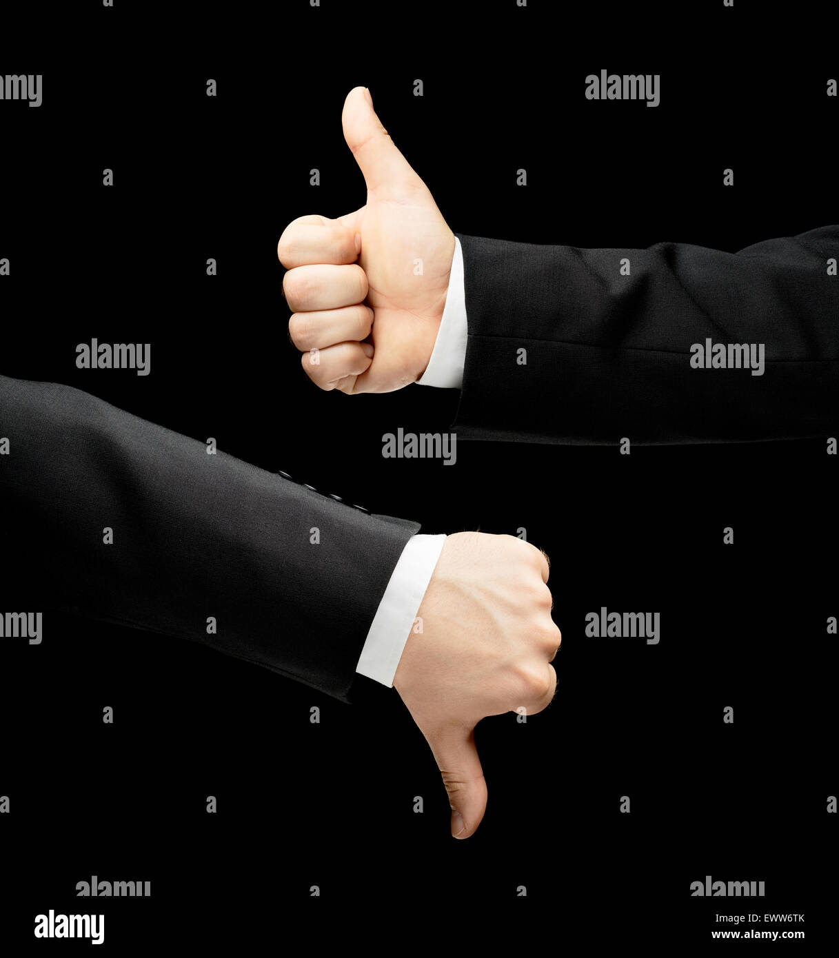Caucasian male hand in a business suit, showing thumbs up and down ...