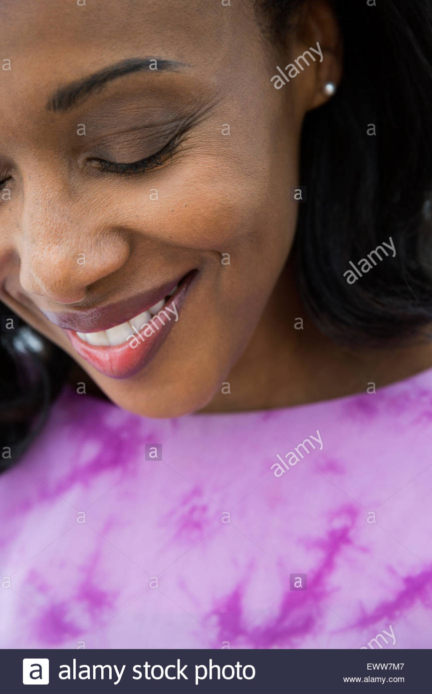 Close up smiling woman with eyes closed Stock Photo - Alamy