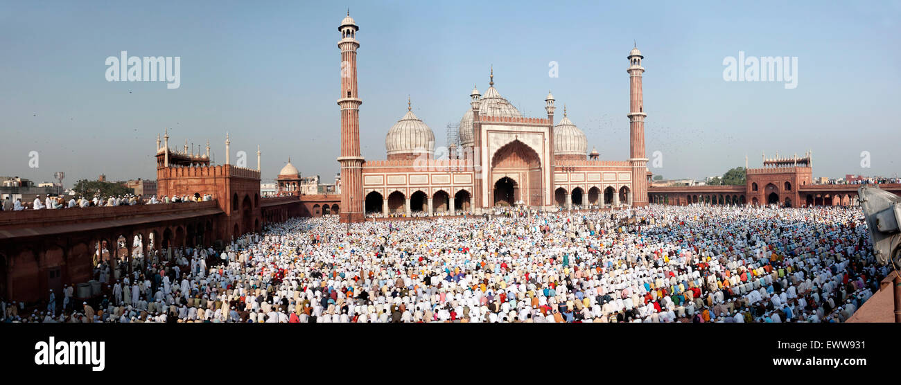 Panoramic shot of the festival of Eid-ul-fitr being celebrated at the Jama Masjid mosque in old Delhi, India. Stock Photo