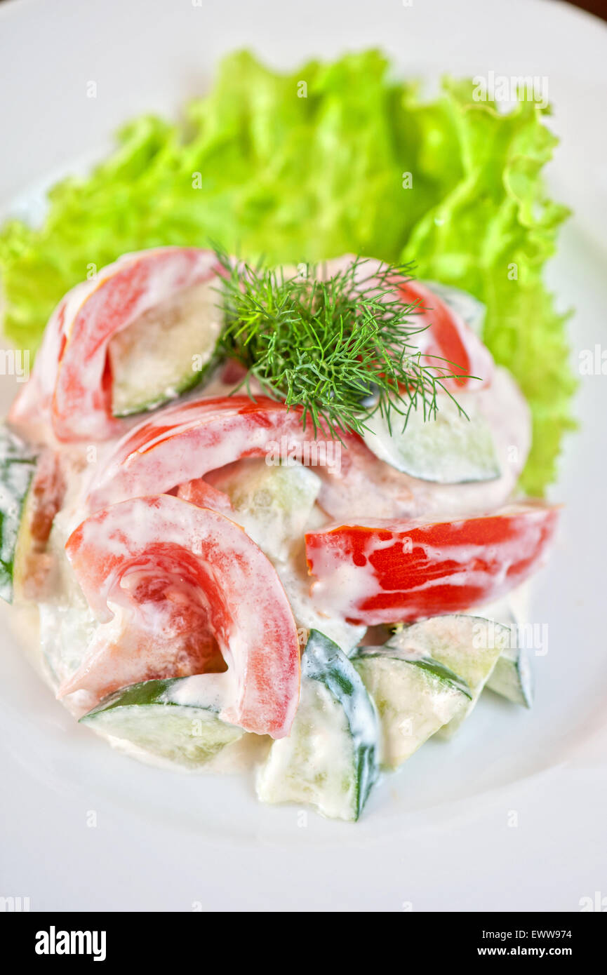 Salad from cucumber tomato Stock Photo - Alamy