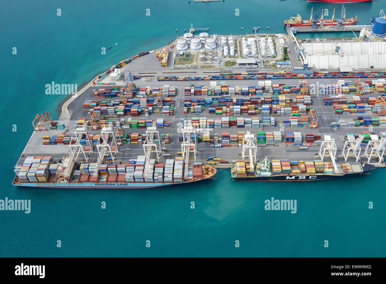 AERIAL VIEW. Containers and container ships on the Adriatic coast. Port of Koper, Slovenia. Stock Photo