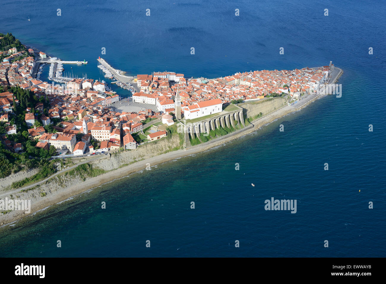 AERIAL VIEW. Medieval city jutting out into the Adriatic Sea. City of Piran (also known as Pirano, its Italian name), Slovenia. Stock Photo