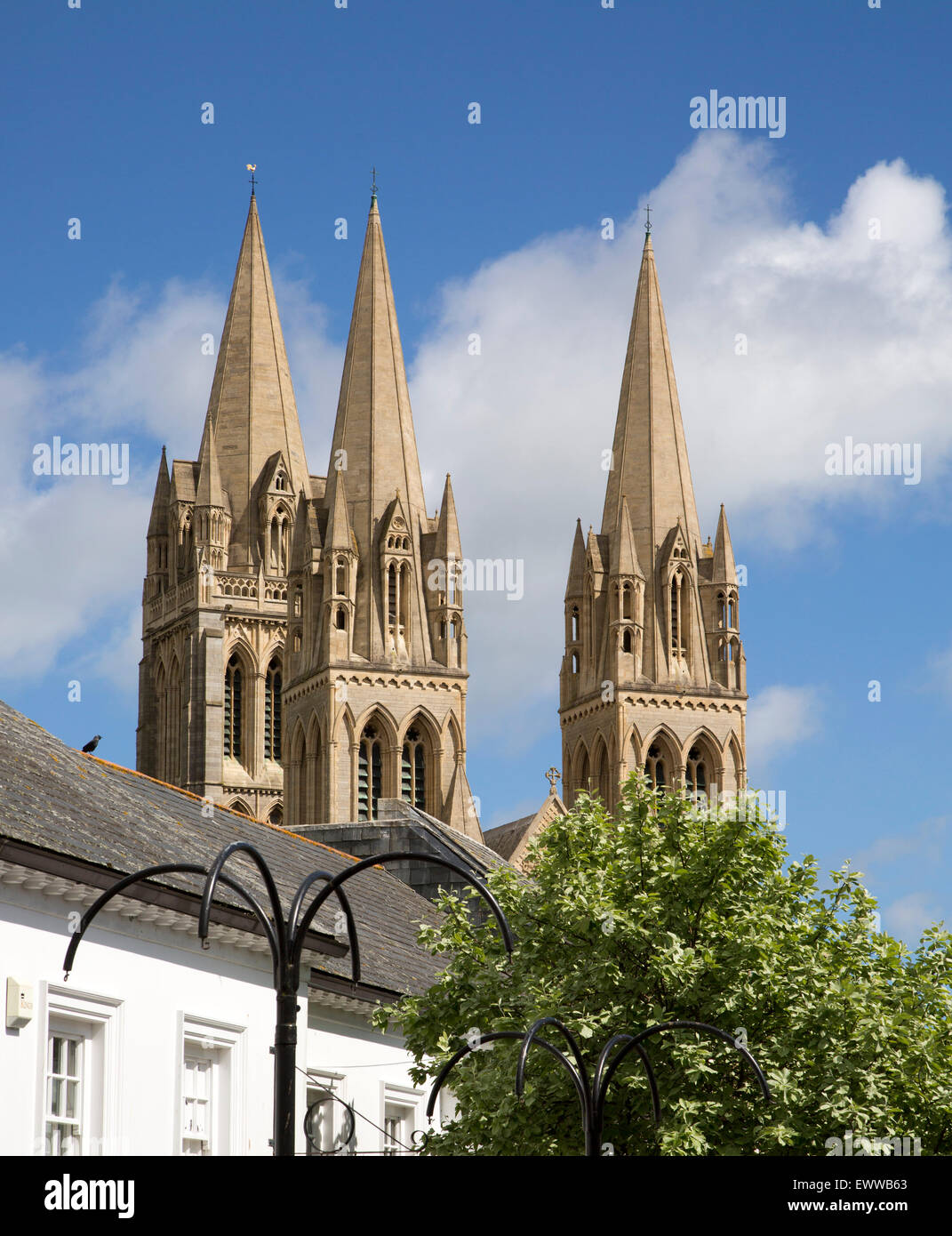 Spires of cathedral rise above historic city centre buildings, Truro, Cornwall, England, UK Stock Photo