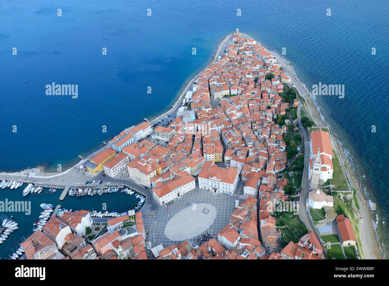 AERIAL VIEW. Medieval city jutting out into the Adriatic Sea. City of Piran (also known as Pirano, its Italian name), Slovenia. Stock Photo