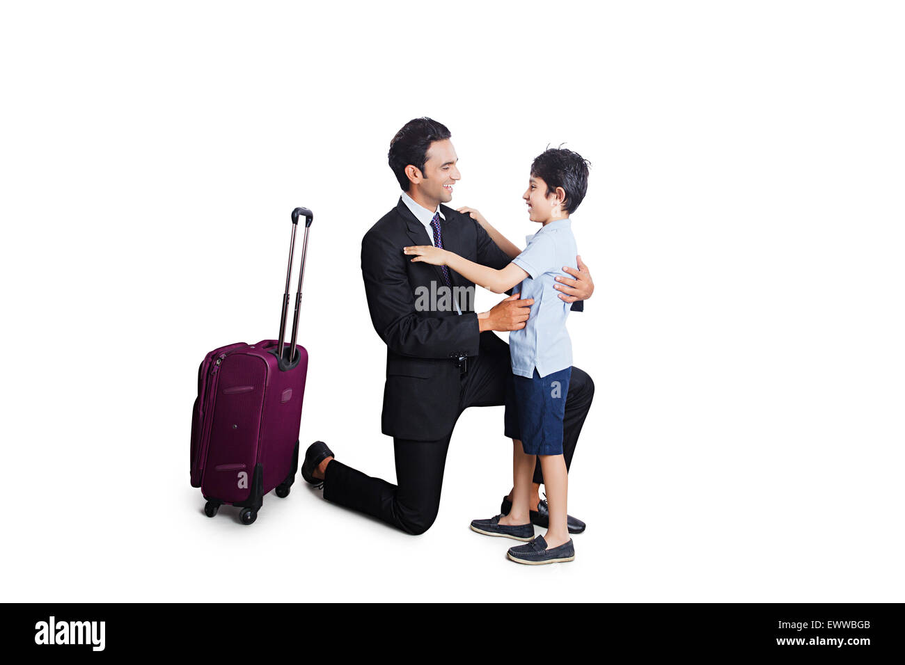 indian father and son Hugging Airport Stock Photo