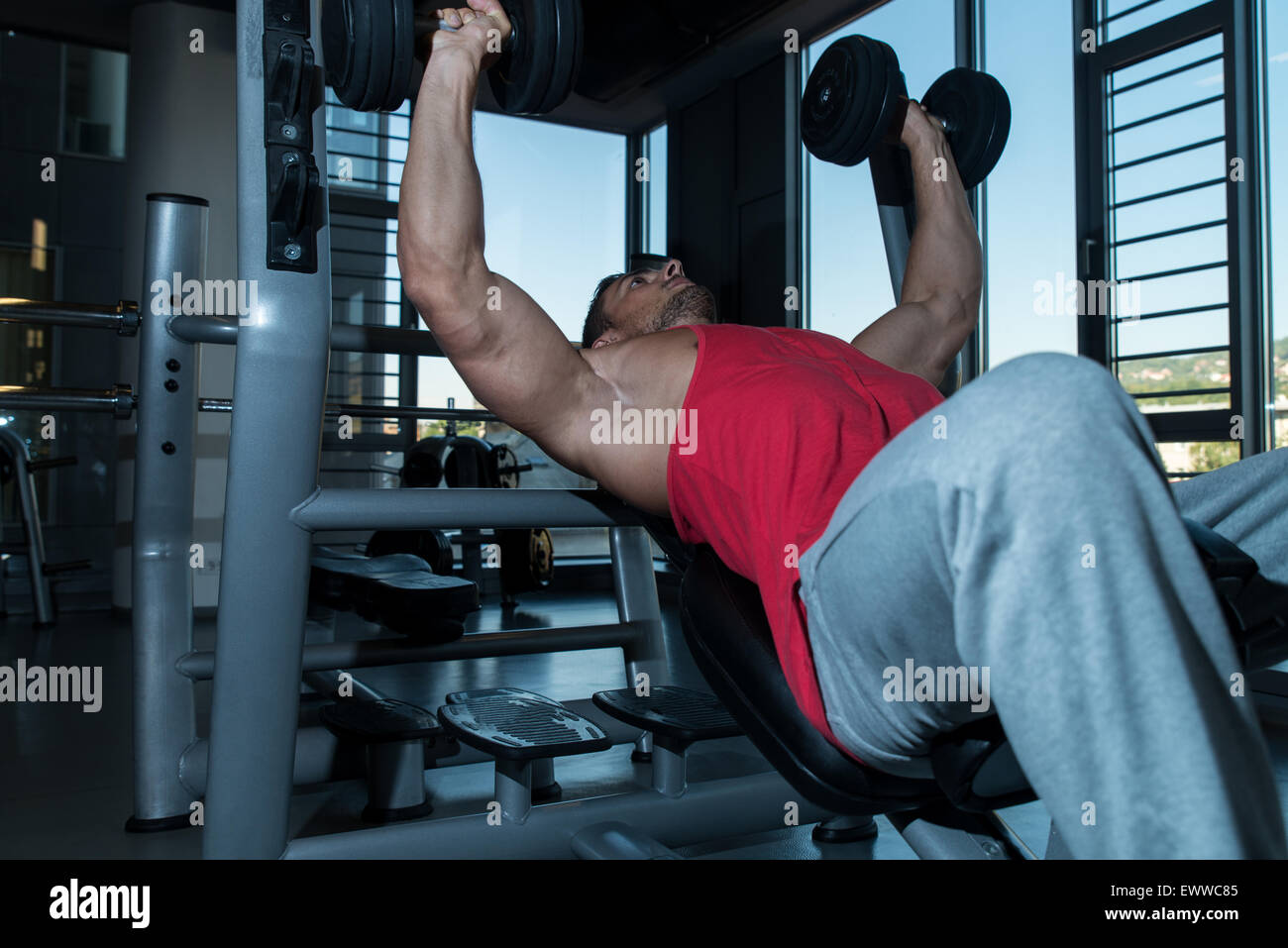 Dumbbell presses hi-res stock photography and images - Alamy
