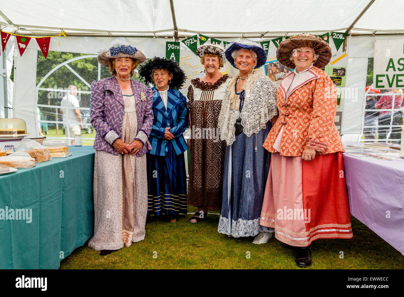 Members of The Women's Institute Dressed In Period Clothing, Nutley Village Fete, Nutley, Sussex, UK Stock Photo