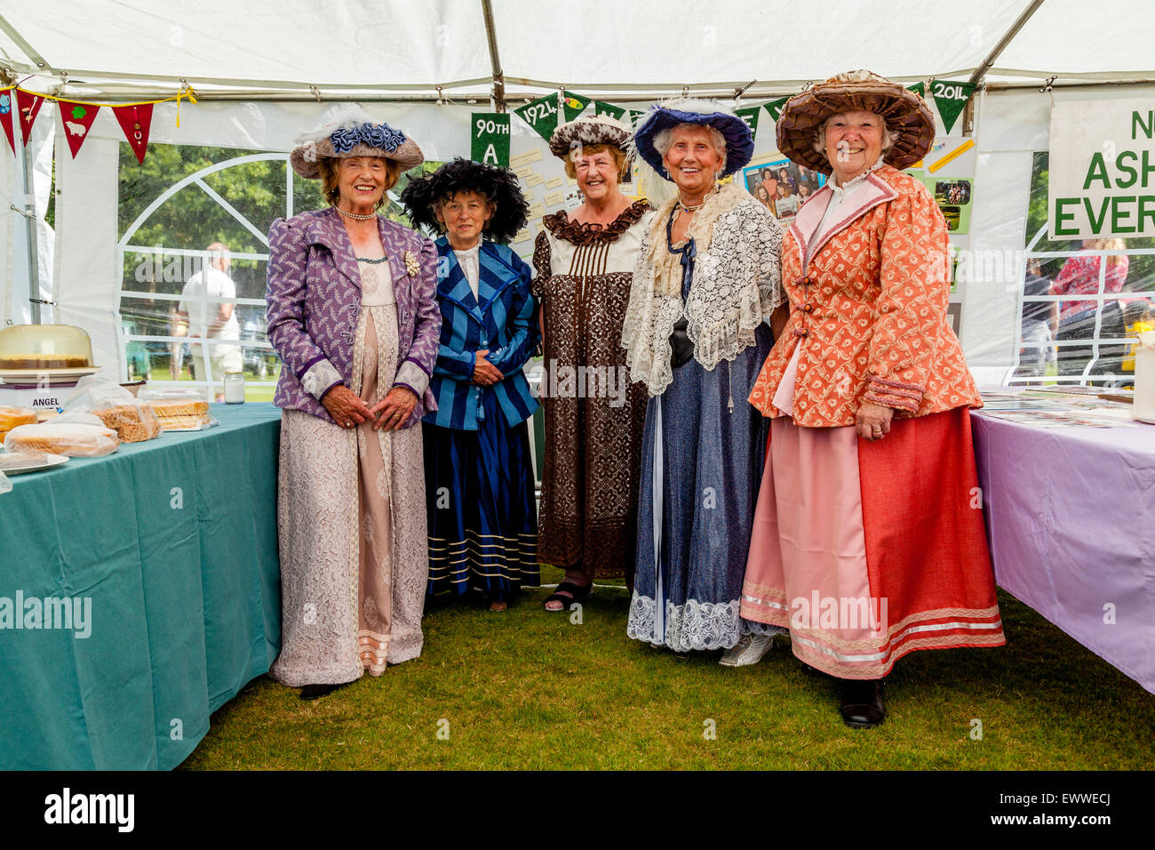 Members of The Women's Institute Dressed In Period Clothing, Nutley Village Fete, Nutley, Sussex, UK Stock Photo