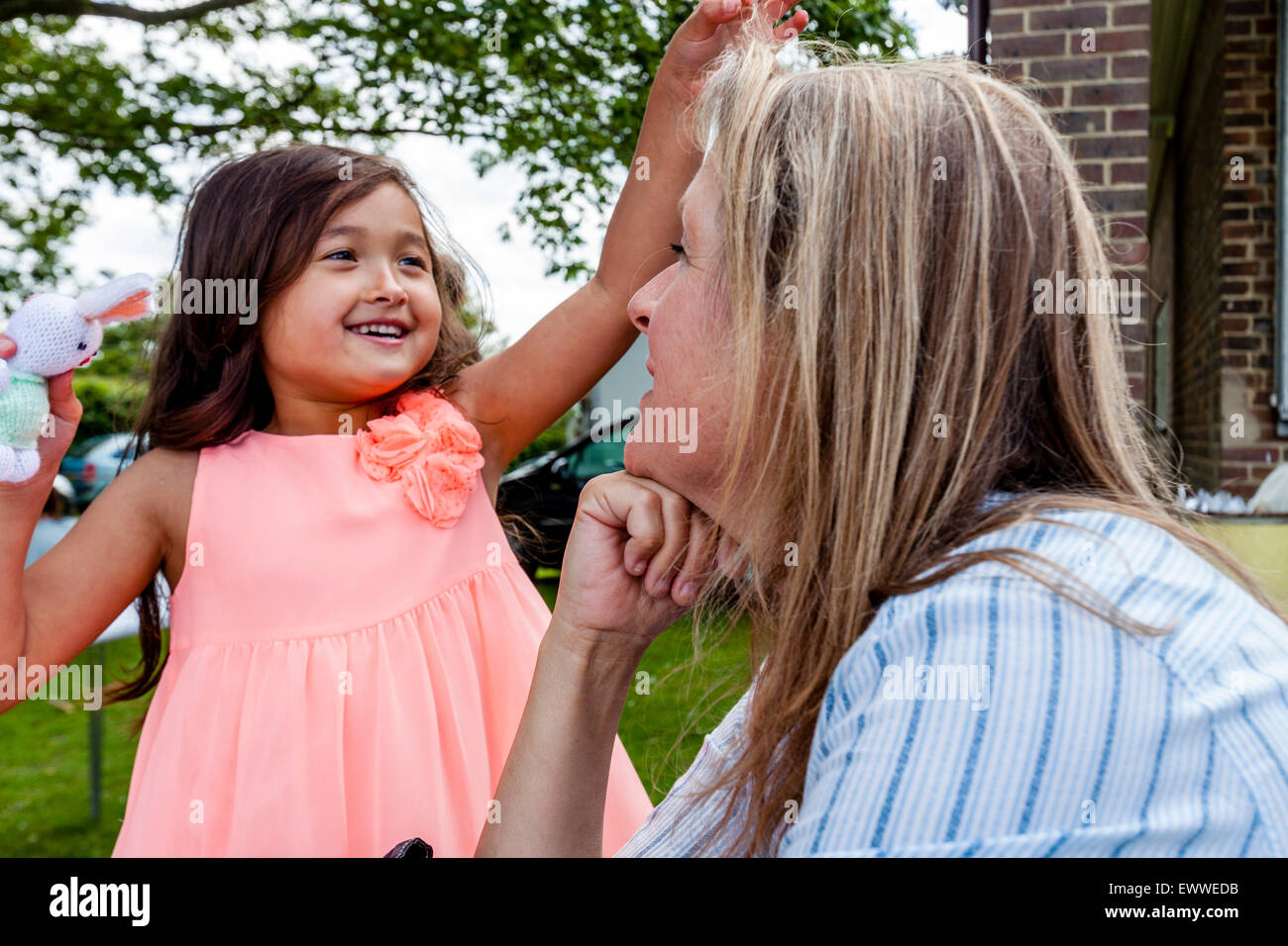 Mixed race families talking uk hires stock photography and images Alamy