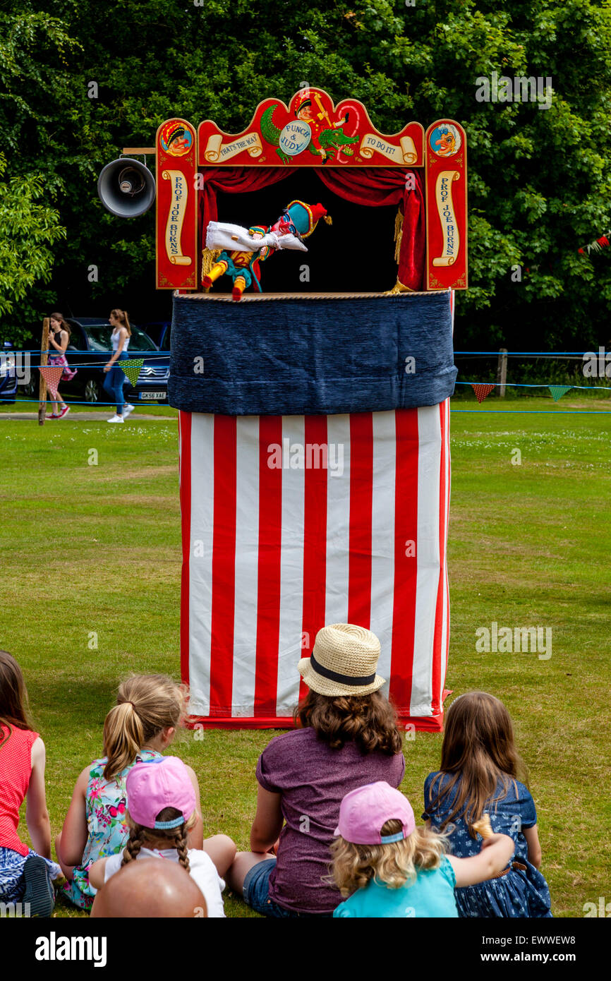 Local Children Watch A Traditional Punch & Judy Show At The Annual