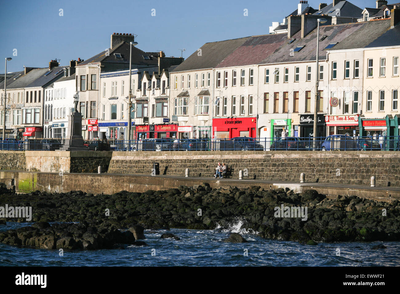 Port Stewart, a seaside resort town, and harbour provides a scenic coastal path/promenade with Atlantic views, east of (London) Stock Photo