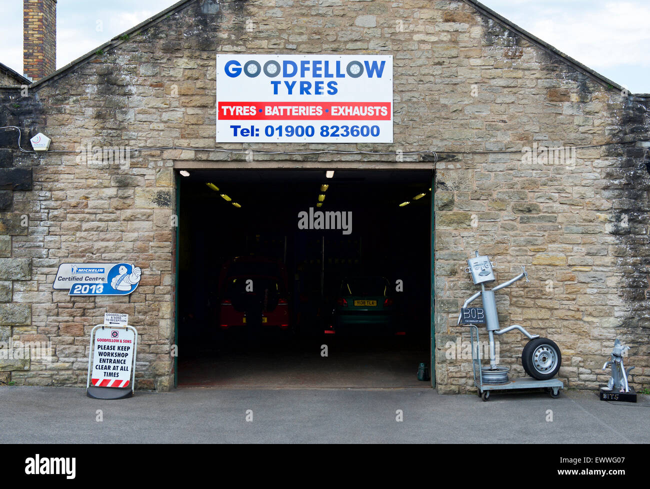 Tyre-fitting workshop, Cockermouth, West Cumbria, England UK Stock Photo