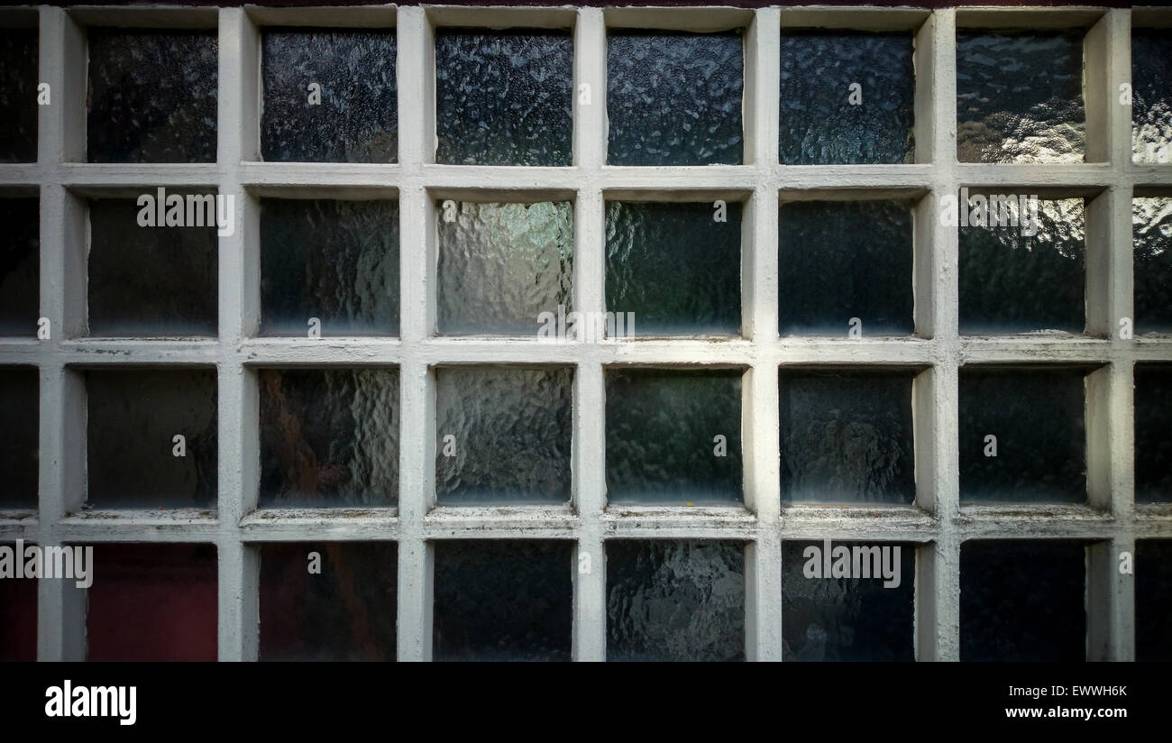 Dirty wall from square wooden frame and glass as background Stock Photo