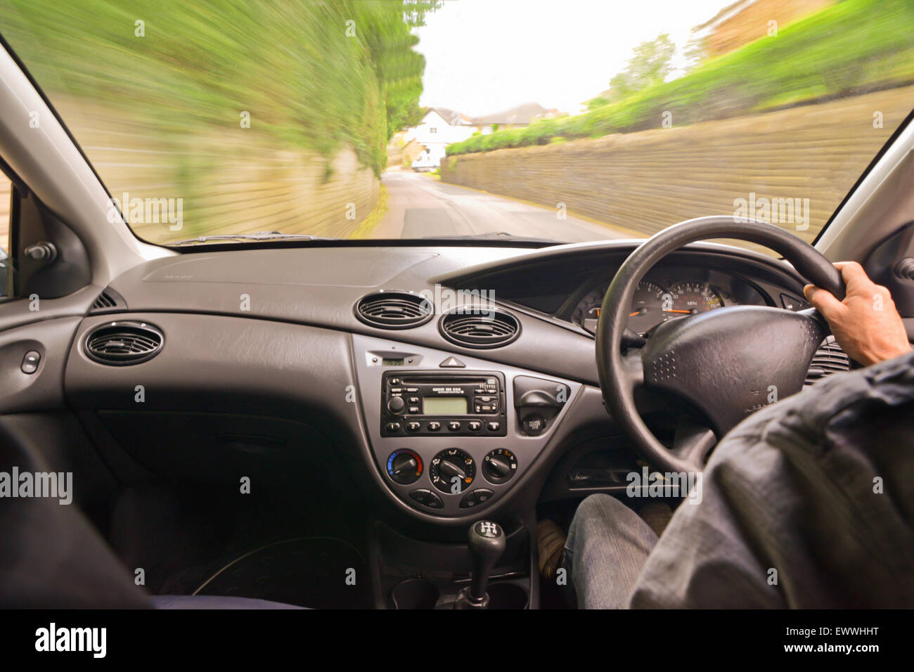 motion blur of rural road from interior of car Stock Photo