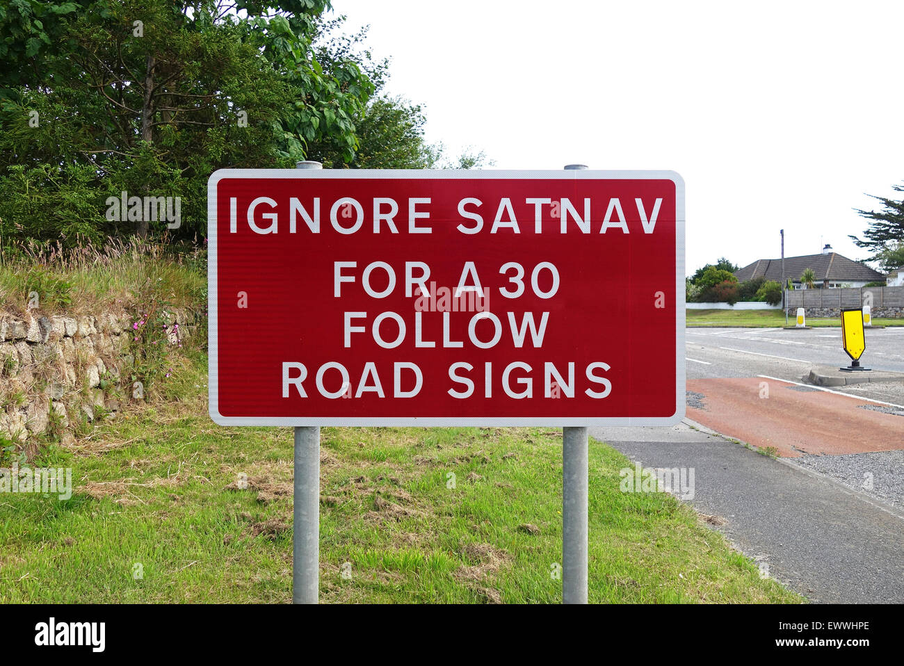 Ignore satnav sign in Cornwall, UK Stock Photo