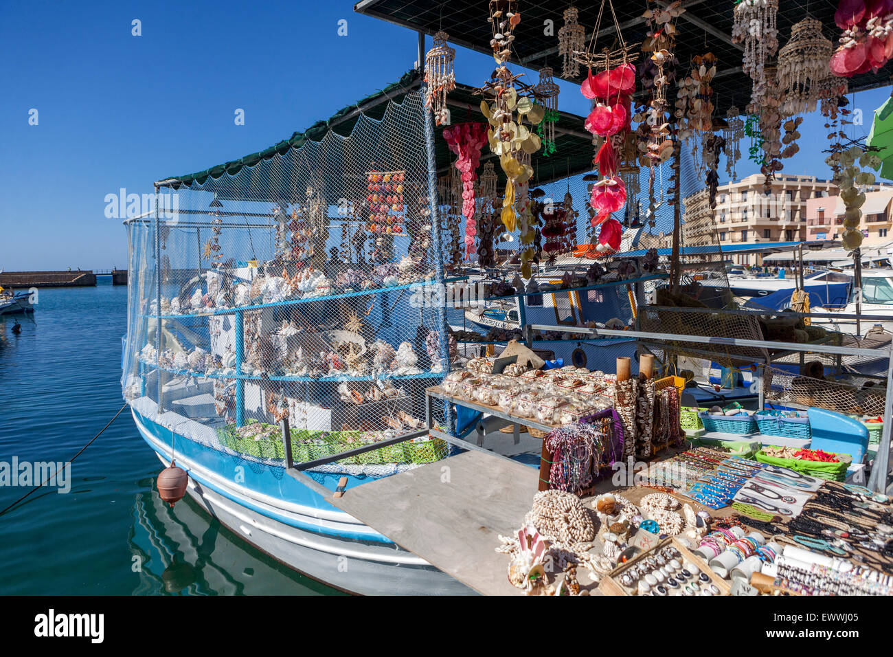 Crete Chania harbour Greece souvenirs Boat sale seashells Chania market boat Stock Photo