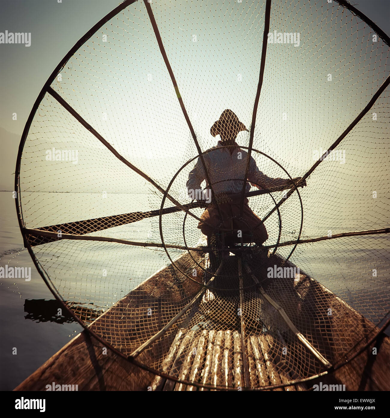 Fisherman on boat sunset hi-res stock photography and images - Alamy