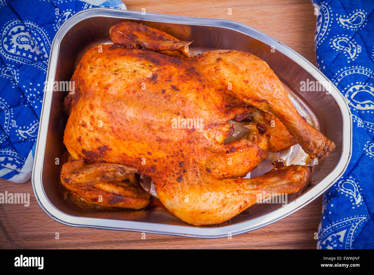 Whole roast chicken baked in aluminum dish, top view Stock Photo Alamy