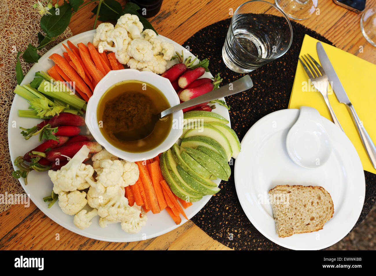 Vegetables served with an olive oil based dipping sauce at Corconne, France. The ingredients are locally sourced. Stock Photo