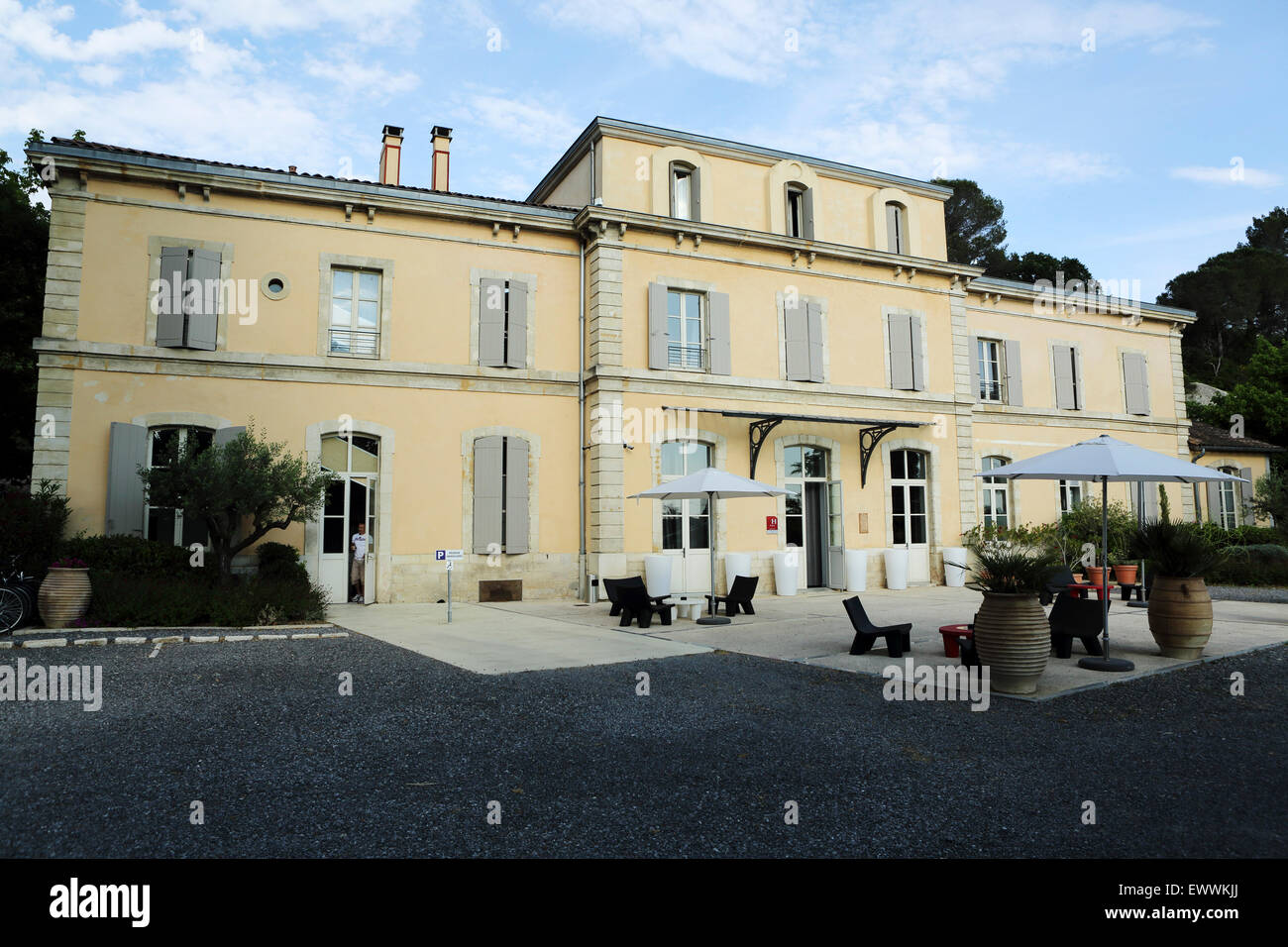 Facade of the Hotel Estelou in Sommieres, France. The hotel is in a former railway station built in the 1870s. Stock Photo