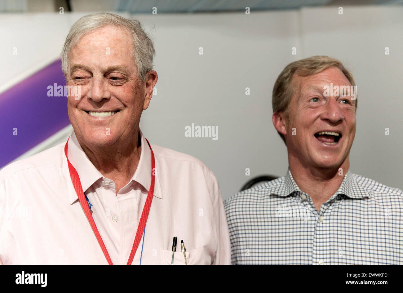 Aspen, Colorado, USA. 01st July, 2015. DAVID KOCH, left, and TOM STEYER, two billionaires on opposite sides of the climate change issue, pose for photos at the Aspen Ideas Festival. Mr. Koch had been in the front row for Mr. Steyer's onstage discussion about energy issues. Credit:  Brian Cahn/ZUMA Wire/Alamy Live News Stock Photo