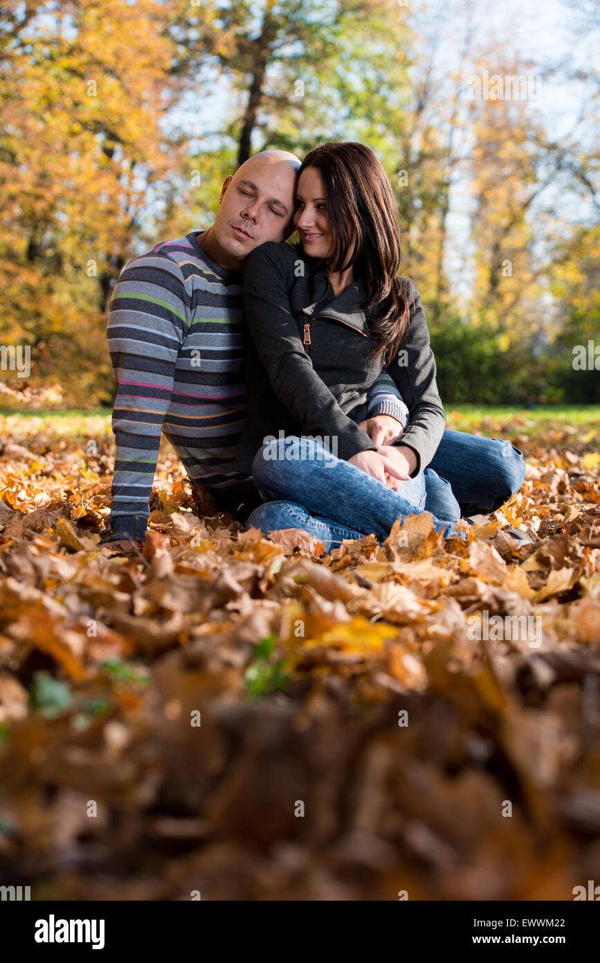 Loving couple kissing in autumn hi-res stock photography and images - Alamy