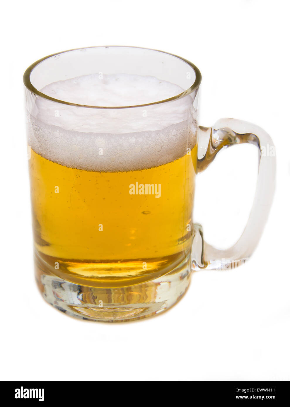 Mug of beer with froth over white background Stock Photo