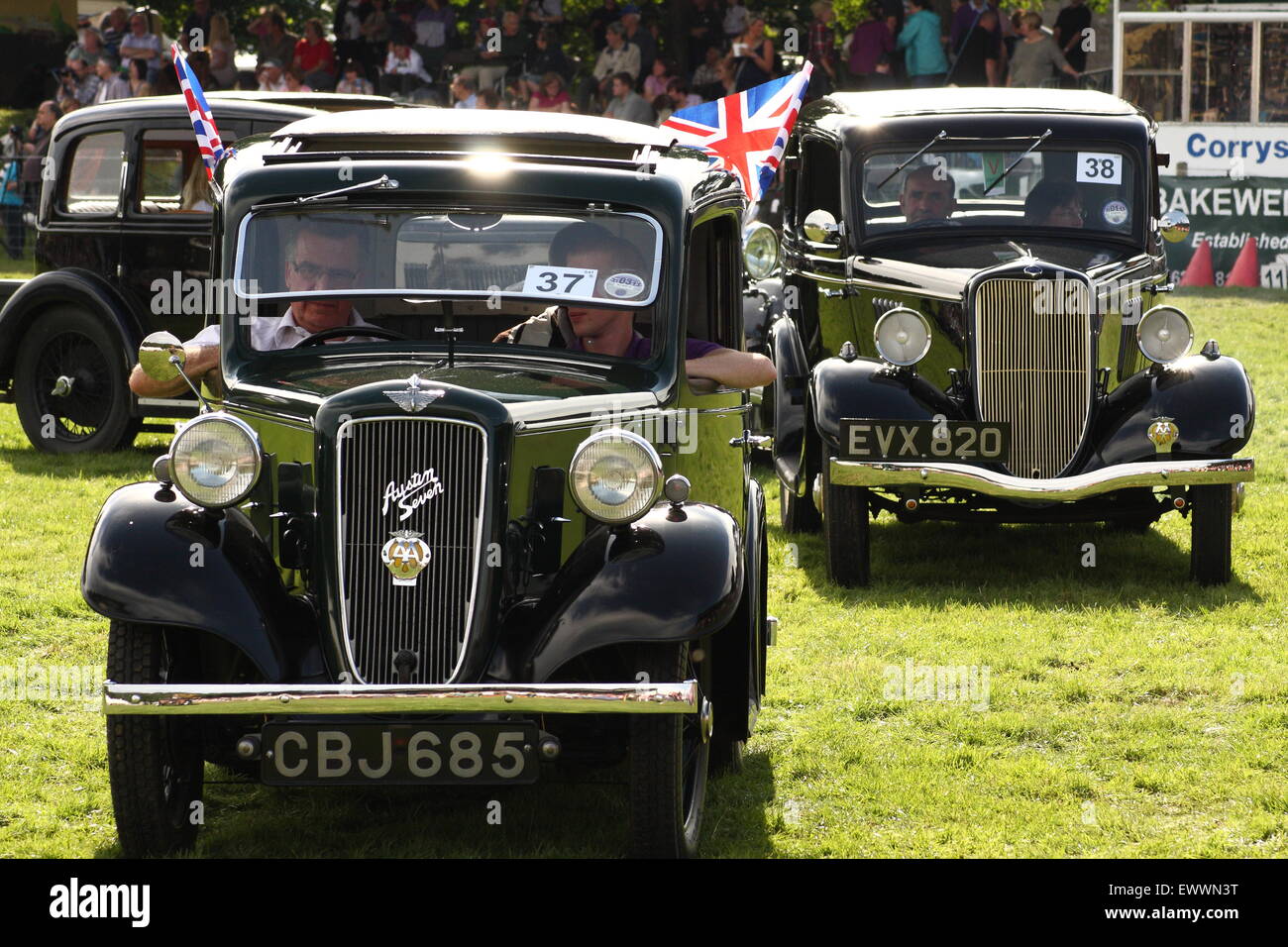 The vintage car parade gets underway at Chatsworth Country Fair, PEak District Derbyshire England uk Stock Photo