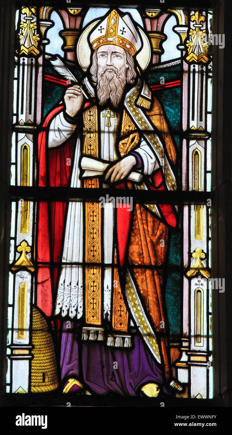 STABROEK, BELGIUM - JUNE 27, 2015: Stained glass window depicting Saint Ambrose or Ambrosius, in the Church of Stabroek, Belgium Stock Photo